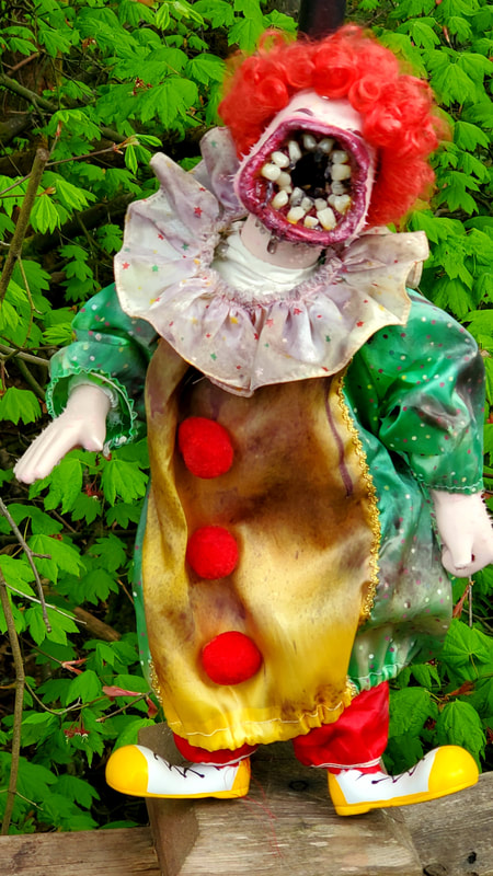 Tastee the Clown: in a world gone mad, Tastee the Clown is here for you. Features a mouth full of teeth (and not much else) and taste buds dotting his hands and face. Handle with care.